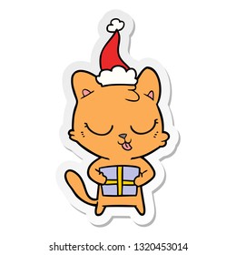 cute hand drawn sticker cartoon of a cat wearing santa hat