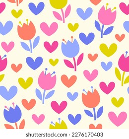 Cute hand drawn tulip and heart seamless pattern background.