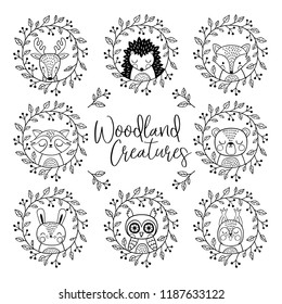 Cute hand drawn vector animals in wreath. 