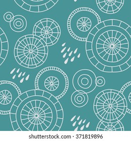 Cute hand-drawn pattern with Japanese umbrellas and raindrops. Vector background.