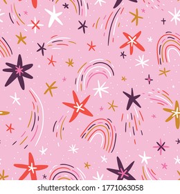 Cute hand-drawn seamless pattern with stars and rainbows on pink background. Vector repeated design for kids fabric. 