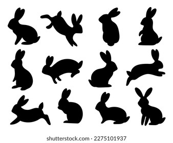 Cute hand-drawn silhouettes of bunnies on a separate white background. Easter symbol 