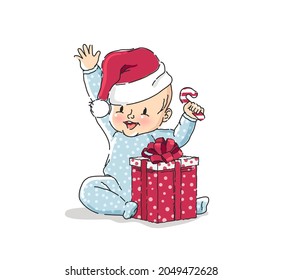 Cute happy baby boy sitting on floor in Santa Claus hat with gift box. Vector cartoon illustration