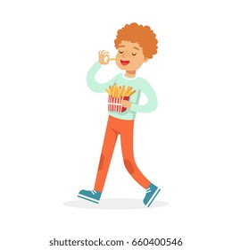 Cute happy boy eating french fries, colorful character vector Illustration