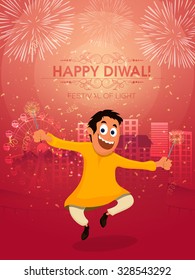 Cute happy boy playing with firecrackers, celebrating and enjoying on occasion of Indian Festival of Lights, Happy Diwali celebration.