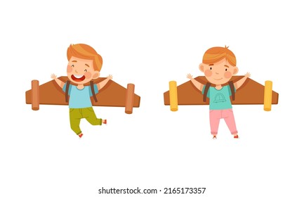 Cute happy boys flying with cardboard wings cartoon vector illustration