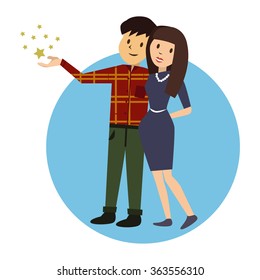 cute happy couple embracing. guy in a checkered shirt holding a star in his hands. girl in a blue dress with a necklace