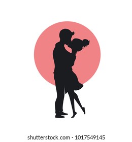 cute happy couple in love hugging and kissing romantic silhouette