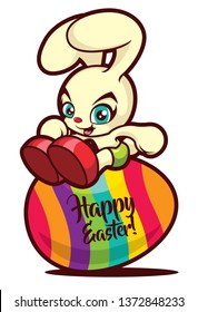 Cute happy easter bunny sit on top of painted colourful egg. Painted egg with happy easter.