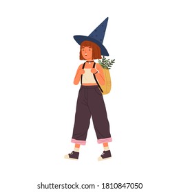 Cute happy girl wearing witch hat carry backpack full of magical herbs. Funny portrait of joyful little wizard with mysterious plants. Flat vector cartoon childish illustration isolated on white