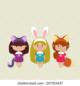 cute happy girls in animal costumes - cat fox bunny