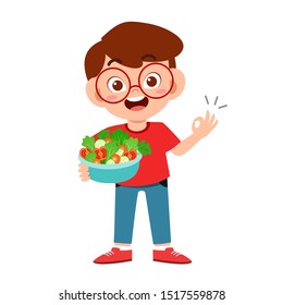 cute happy kid eat salad vegetable fruits