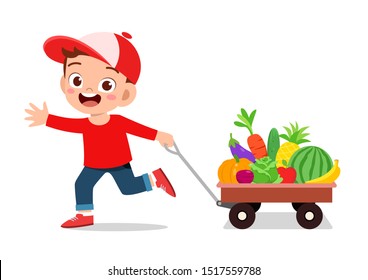 cute happy kid harvest fruit and vegetable