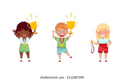 Cute happy kids with gold trophy cup and medal set. Winners celebrating victory in competition vector illustration