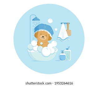 Cute happy puppy takes shower in a littlle dog bath