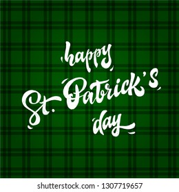 Cute Happy St. Patrick's day calligraphy quote on a green plaid background decorated by paint drops. Perfect for posters, banners, prints, greeting cards design ideas.