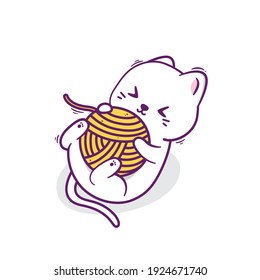 cute happy white cat playing yarn ball