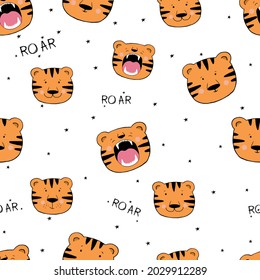 Cute head tigers. Seamless funny pattern with cartoon tigers.
