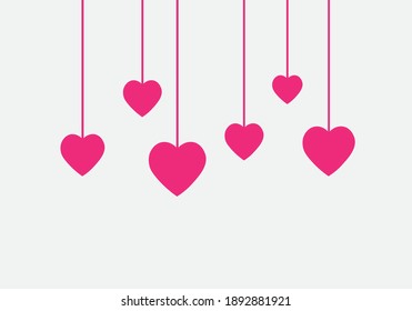 Cute hearts hanging from the ceiling and hanging with a string