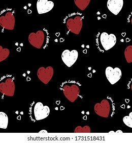 Cute hearts pattern  on black background for textile, wrapping. Valentine wallpaper.