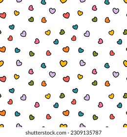 Cute hearts seamless pattern. Many multi colored chaotic and small hearts repeating texture on white background. Endless or unending pattern, vector illustration
