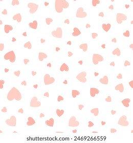 Cute hearts seamless vector pattern. Valentines day background. Flat design endless chaotic texture made of tiny heart silhouettes. Shades of old pink.