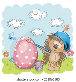 Cute Hedgehog with brush is colored an egg 