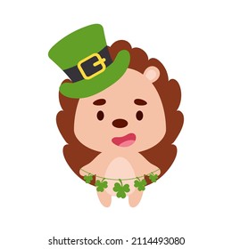 Cute hedgehog in St. Patrick's Day leprechaun hat holds shamrocks. Irish holiday folklore theme. Cartoon design for cards, decor, shirt, invitation. Vector stock illustration.