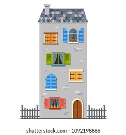 Cute high vector gray house with tile roof and many windows of different shapes and colors with shutters and a door. Traditional european street. Cartoon building. Town element. Fairy tale house