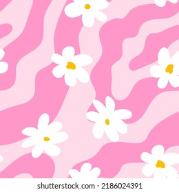 Cute hippie and groovy seamless pattern with daisy flowers and wavy shapes. Fashionable background in 00s, 90s, y2k style.