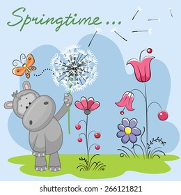 Cute Hippo with dandelion on a meadow 