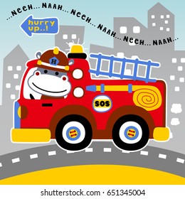 Cute hippo driving firetruck on buildings background, vector cartoon illustration