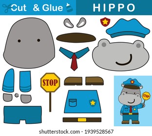 Cute hipopótamo con uniforme de policía de tráfico. Juego de papel educativo para niños. Corte y pegado. Ilustración de dibujos animados