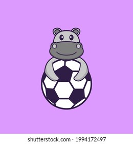 Cute hippopotamus playing soccer. Animal cartoon concept isolated. Can used for t-shirt, greeting card, invitation card or mascot.