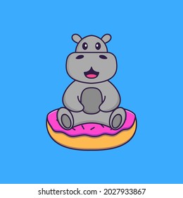 Cute hippopotamus is sitting on donuts. Animal cartoon concept isolated. Can used for t-shirt, greeting card, invitation card or mascot.