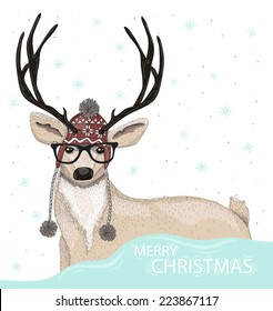Cute hipster deer with hat and glasses winter background. Christmas greeting card