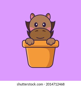 Cute horse in a flower vase.