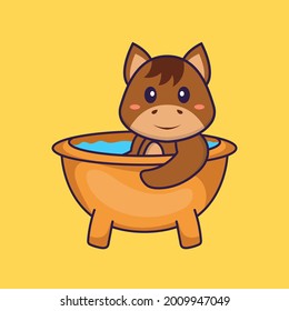 Cute horse taking a bath in the bathtub. Animal cartoon concept isolated. Can used for t-shirt, greeting card, invitation card or mascot.