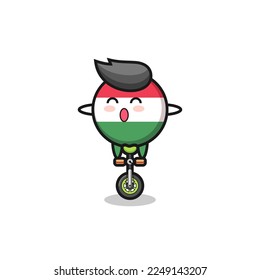 The cute hungary flag badge character is riding a circus bike , cute style design for t shirt, sticker, logo element