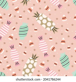 Cute illustrated halloween pattern. Seamleass repeated background. Candy, candy corn, lolypop.