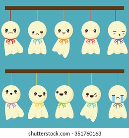 Cute Japanese Hang Dolls In Blue Background