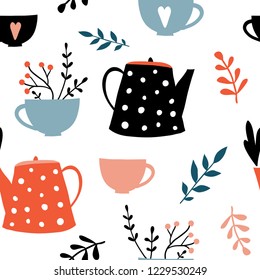 Cute kettle and cup seamless pattern. Herbal tea mugs with flowers and Leaves. Vector hand drawn doodle illustration. Autumn and winter mood. Cozy kitchen fabric, textile design