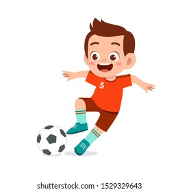 cute kid boy play soccer as striker