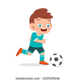 cute kid boy play soccer as striker