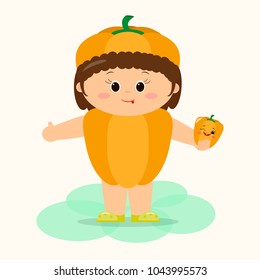 A cute kid in orange pepper suit is holding a vegetable in his hands.