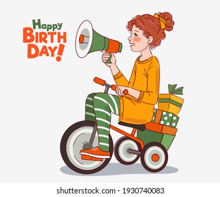 Cute kid rides on bicycle. Funny girl shouting on the megaphone