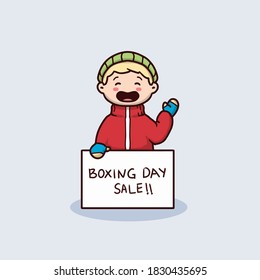 Cute kid with winter clothing holding boxing day sale banner