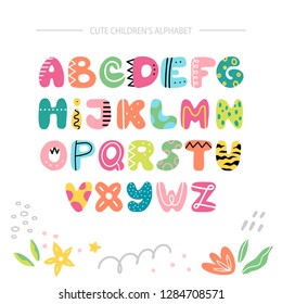 Cute kids alphabet in a cartoon style isolated on white background. Vector illustration.