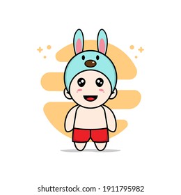 Cute kids character wearing rabbit costume. Mascot design concept