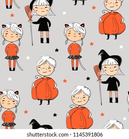 Cute kids in halloween costumes. Colored vector seamless pattern. Grey background